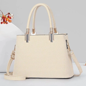 Beige woven multi-layer handbag with crossbody strap and luxury textured finish