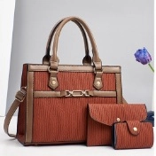 Three-piece brick red handbag set featuring vertical wavy texture and metal buckle detail