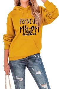 Detail of Frenchie Mom text and bulldog illustration on a yellow hooded sweatshirt