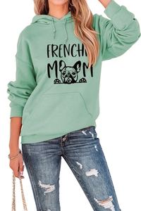 Detail of mint green Frenchie Mom hoodie featuring kangaroo pocket and print on model
