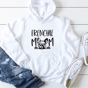 Close-up of Frenchie Mom hoodie flat lay with denim jeans and canvas sneakers on wood