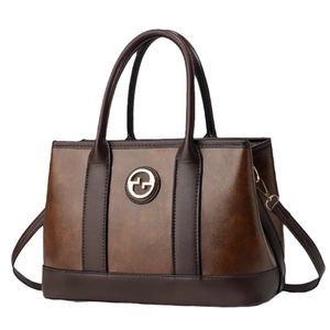 Borsa a mano alla moda in pelle marrone bicolore con tracolla e dettagli dorati