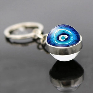 Portachiavi con occhio turco con ciondolo in vetro blu e anello in metallo argentato