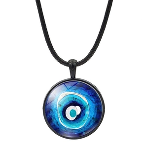Blue evil eye pendant necklace with black cord cord on a clean white background