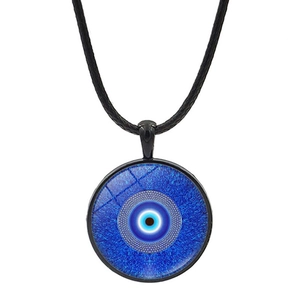 Blue Evil Eye pendant necklace with black leather cord on a white background