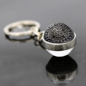 Nordic Viking compass keychain with double-sided glass orb and Odin rune engravings