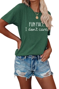Detail of Fun Fact I Don't Care printed text on dark green cotton T-shirt