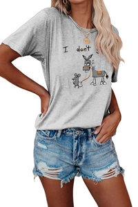 Detail of grey graphic t-shirt with cartoon donkey print and ripped blue denim shorts