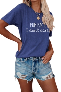 Detail of Fun Fact I Don't Care slogan print on navy blue cotton t-shirt