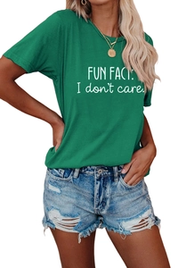 Detail of FUN FACT I DON'T CARE text print on dark green cotton crew neck t-shirt