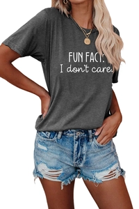 Detail of Fun Fact I Don't Care slogan print on charcoal grey short sleeve T-shirt
