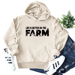 Beige hoodie with Life Is Better On The Farm text and tractor graphic with casual wear