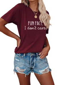 Detail of burgundy women's T-shirt with 'FUN FACT: I don't care' slogan print
