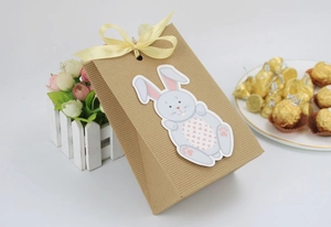 Easter rabbit kraft paper gift bag with yellow silk bow and cute cartoon bunny sticker