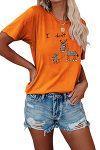 Detail of female model wearing orange graphic t-shirt with mouse print and denim shorts