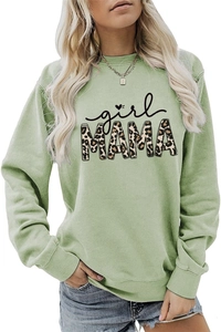 Close-up of sage green sweatshirt featuring girl MAMA leopard print and cursive text