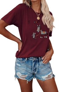 Detail of red cartoon graphic t-shirt and distressed denim shorts street style set
