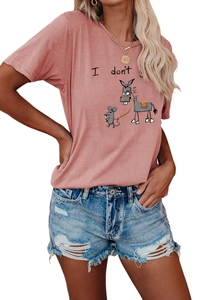 Detail of graphic t-shirt with mouse and donkey print paired with distressed denim shorts