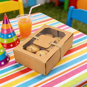 Detail of kraft paper food box with transparent window and hemp rope for party cookies