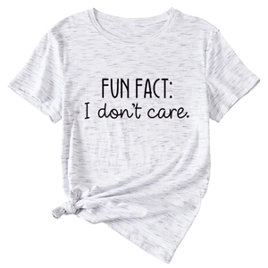 Detailed view of the Fun Fact I Don't Care slogan print and knot-tie hem on white tee