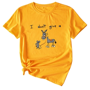 Detail of a bright yellow cotton T-shirt with funny quote and knotted hem design