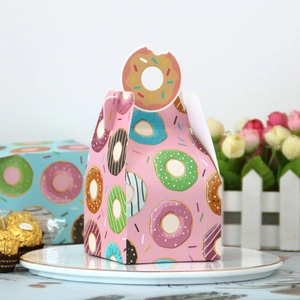Pink donut patterned pastry gift box with a unique creative bite-mark handle design