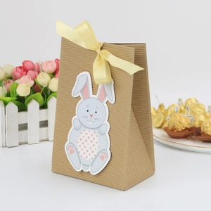 Easter bunny kraft paper gift bag with silk ribbon bow and blue rabbit card decoration