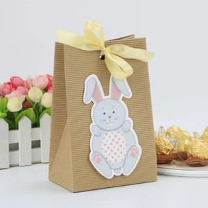 Easter bunny kraft paper gift bag with yellow silk bow and cute cartoon rabbit card