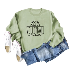 Detail of sage green volleyball mom pullover sweatshirt paired with jeans and sneakers
