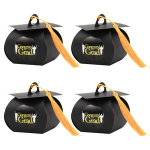 Set of four black graduation cap gift boxes with yellow tassels and Congrats Grad stickers