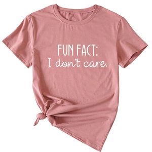 Detail of mauve T-shirt showing round neck, slogan print and stylish knotted hem design