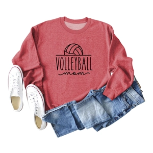 Detail of red crewneck sweatshirt with Volleyball Mom print and casual styling