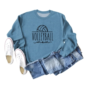 Close-up of the volleyball mom print on a blue long sleeve sweatshirt with knit texture