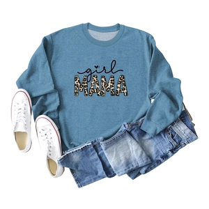 Detail of Girl MAMA leopard print lettering on a casual denim blue sweatshirt