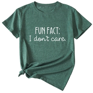 Detail of dark green t-shirt with Fun Fact I don't care text and side knot detail