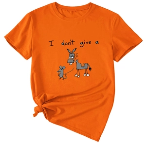Detail of orange t-shirt featuring graphic of a mouse pulling a donkey with humorous text