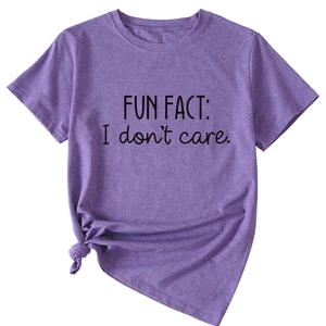 Detail of purple cotton T-shirt featuring Fun Fact I Don't Care slogan and side knot