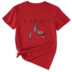 Detail of red crew neck t-shirt featuring I don't give a funny cartoon print and knotted hem