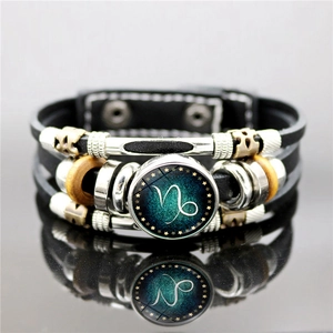 Black leather luminous Capricorn zodiac bracelet with multilayered braided punk style straps