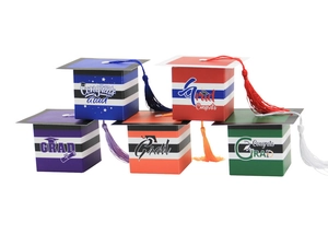 Close-up of five colorful graduation cap gift boxes with tassels and Congrats Grad text