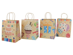 Detail of four kraft paper gift bags featuring birthday cakes, balloons, and round handles
