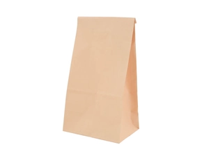 Detail of light brown kraft paper food bag with side gusset design on white background