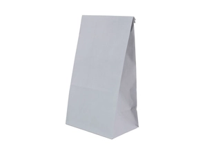 Detail of white kraft paper food bag showing flat bottom and side gusset design