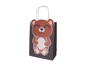 Detail einer braunen Cartoon-Bär-Papiertüte mit weißen Kordelgriffen für Kindergeschenke