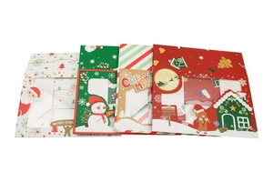 Detailed view of four festive Christmas cookie boxes with transparent display windows