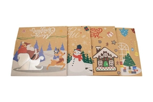 Set of four Christmas kraft paper gift bags with Santa, snowman, and gingerbread house prints