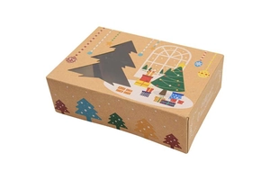 Detail of Christmas kraft paper cookie box with a tree-shaped window and festive patterns