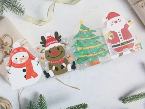 Lot de 4 boîtes cadeaux de Noël transparentes avec motifs bonhomme de neige et Père Noël