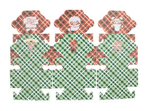 Flat lay of foldable Christmas treat boxes with red green plaid and window cutout