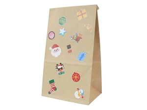 Detail of kraft paper gift bag featuring festive Christmas stickers and reindeer motifs